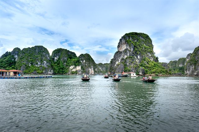 Boats among the limestone karsts of Ha Long Bay, Vietnam
