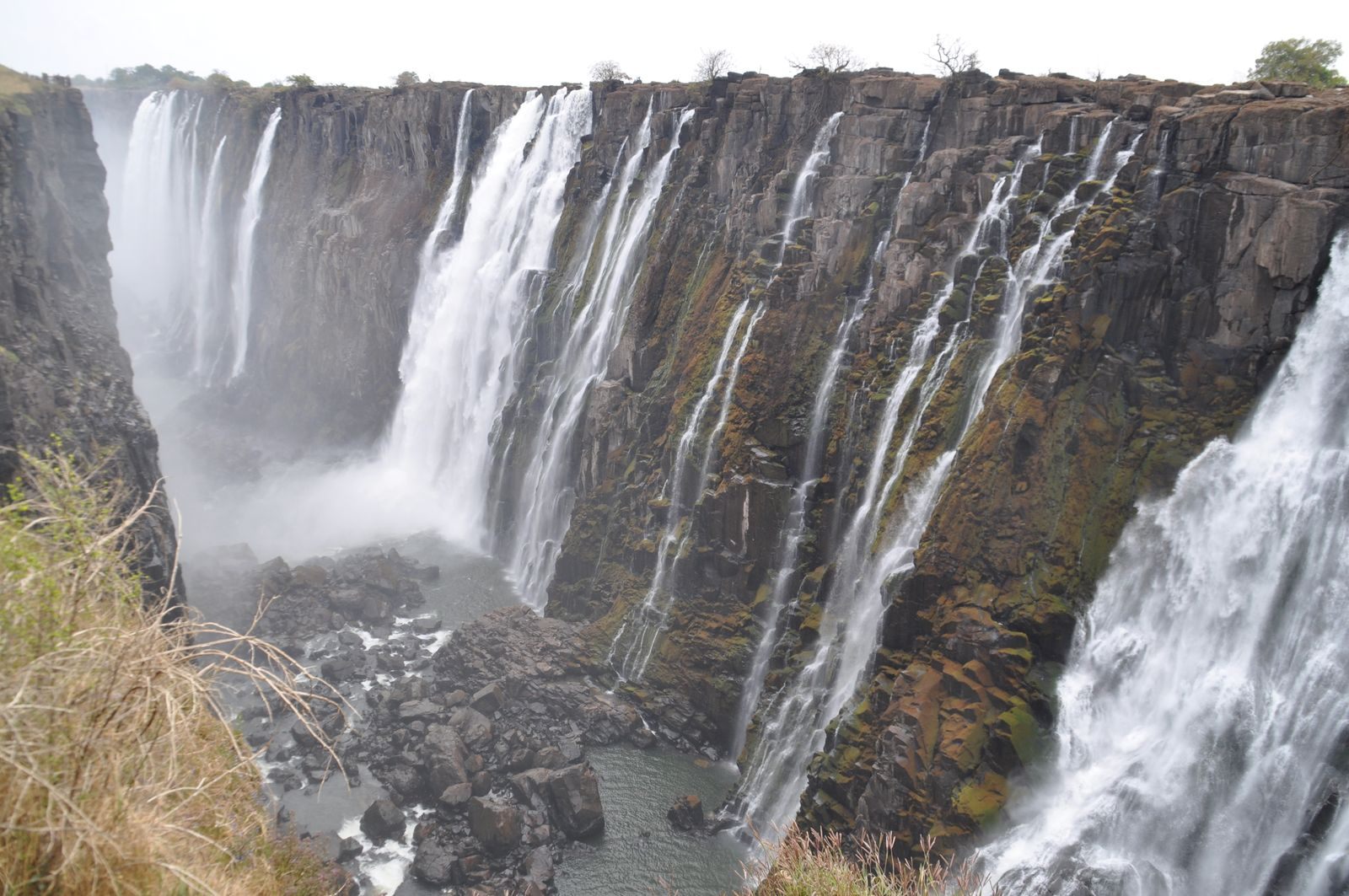 Victoria Falls pouring over rugged basalt cliffs
